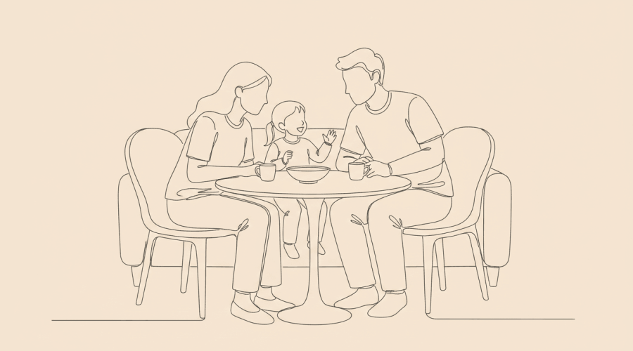 Bilingual family at dinner, parents and child talking naturally